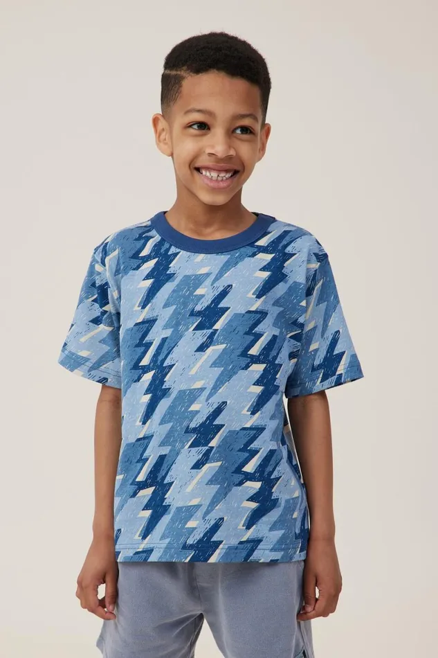 Boys 214 Tops and TShirts Cotton On Jonny Short Sleeve Print Tee Dusty Bluelightning Bolt Yardage