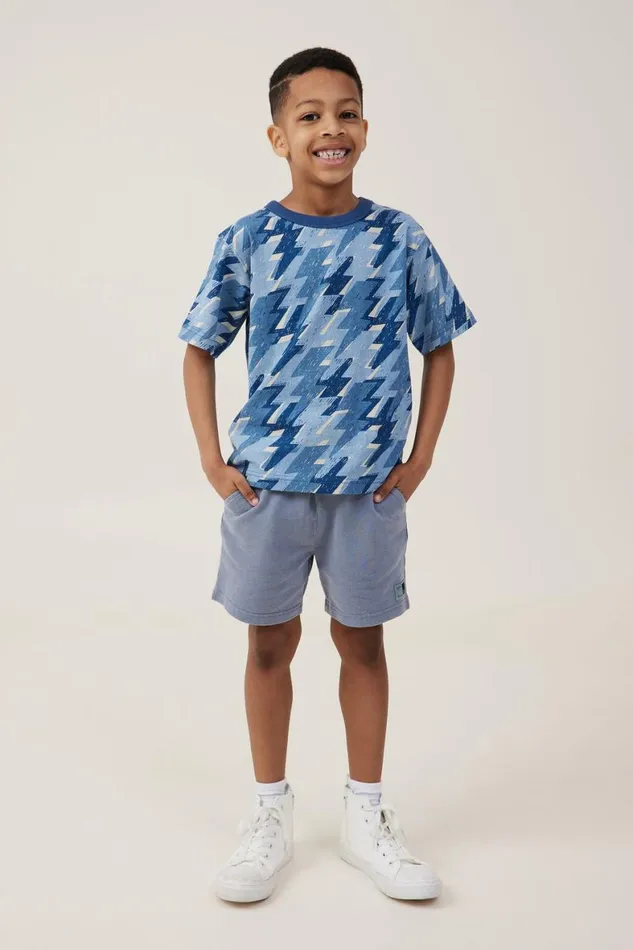 Boys 214 Tops and TShirts Cotton On Jonny Short Sleeve Print Tee Dusty Bluelightning Bolt Yardage